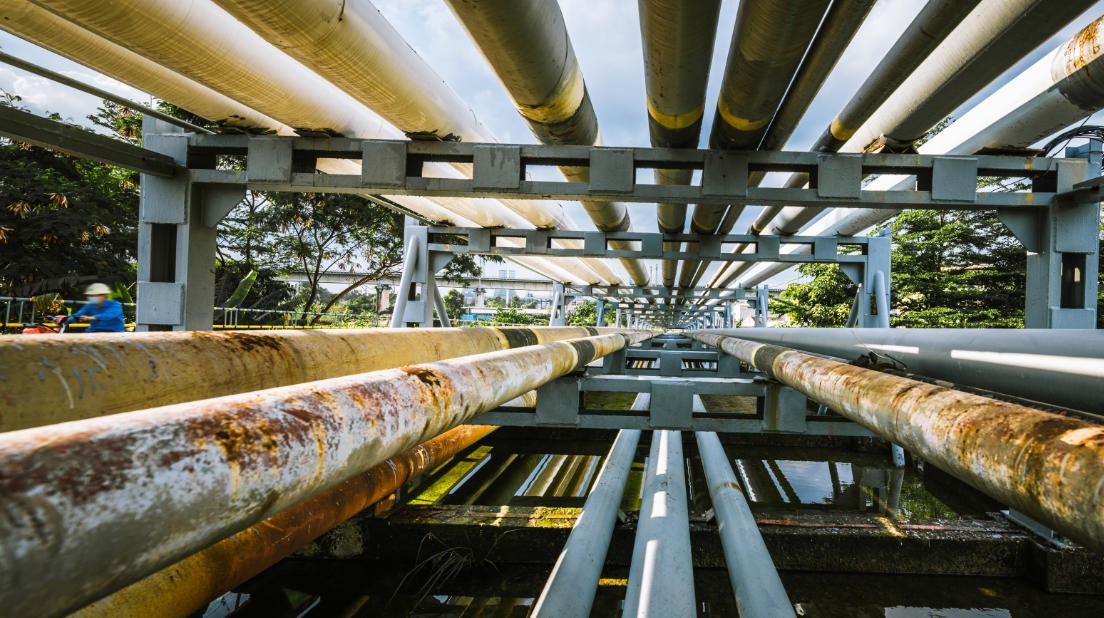Pipework and supporting process infrastructure at a treatment facility.